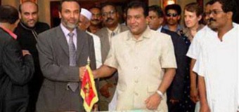 Pro-LTTE Rauf Hakeem, leader of SLMC who supped and shook hands with LTTE Tamil terrorist leader Prabakaran demanding a separate district in the Eastern Province for Muslims to create a separate country in the future.