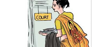 Tamil Lawyer accused of wearing saree with Buddha Image in Jaffna