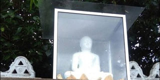Establish a Buddha statue in Mulathive