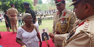 Families of Lankan soldiers missing in action still hope they’ll return   The featured image  shows Maj. Athula’s mother showing his picture to the officers of VIR